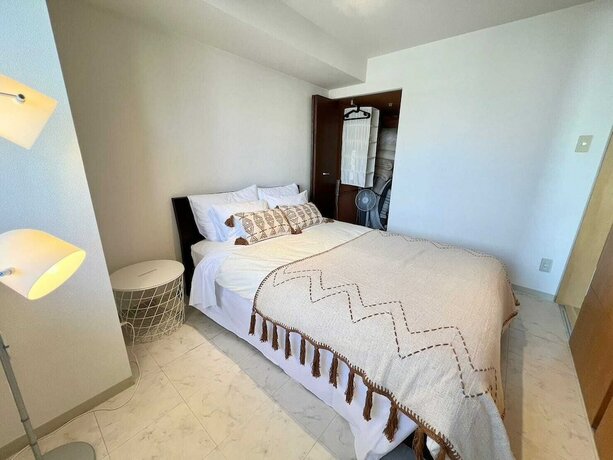 Imagen de la habitación del Hotel AMS Tower Nakajima. Foto 35