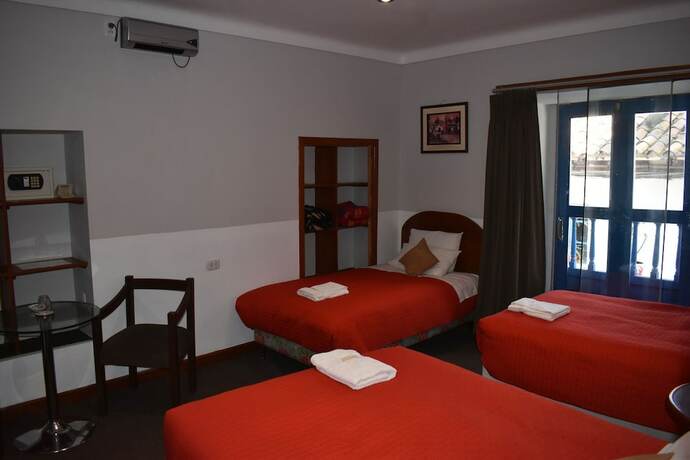 Imagen de la habitación del Hotel AMTALLPA SAN BLAS INN. Foto 6