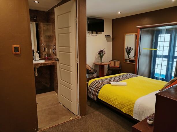 Imagen de la habitación del Hotel AMTALLPA SAN BLAS INN. Foto 7