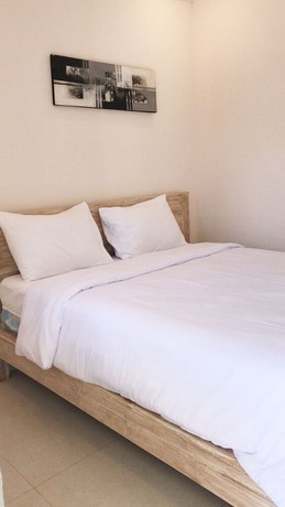 Imagen de la habitación del Hotel A-Manta Homestay. Foto 3