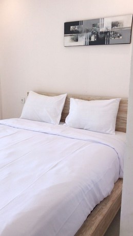 Imagen de la habitación del Hotel A-Manta Homestay. Foto 4