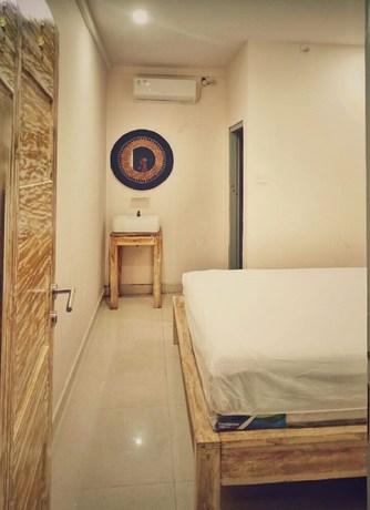 Imagen de la habitación del Hotel A-Manta Homestay. Foto 5
