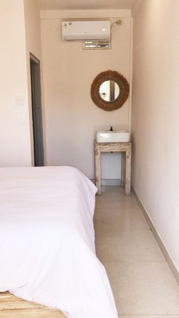 Imagen de la habitación del Hotel A-Manta Homestay. Foto 7