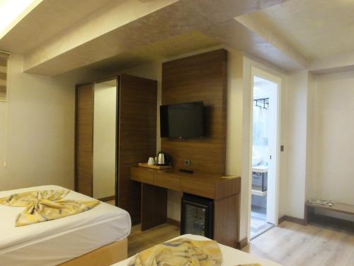 Imagen de la habitación del Hotel ANKUVA HOTEL. Foto 18