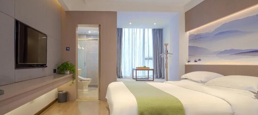 Imagen de la habitación del Hotel ANXIN APARTMENT. Foto 3