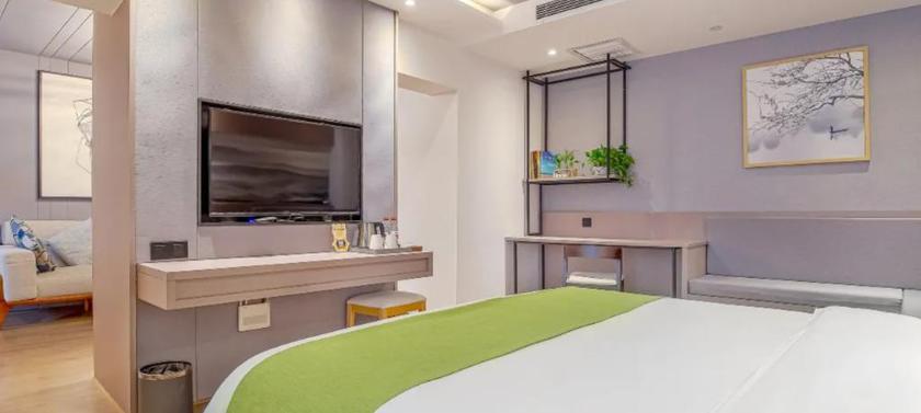 Imagen de la habitación del Hotel ANXIN APARTMENT. Foto 8