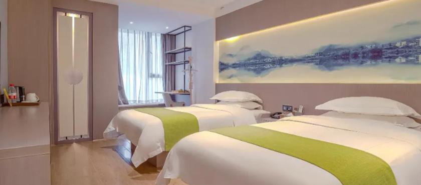 Imagen de la habitación del Hotel ANXIN APARTMENT. Foto 9
