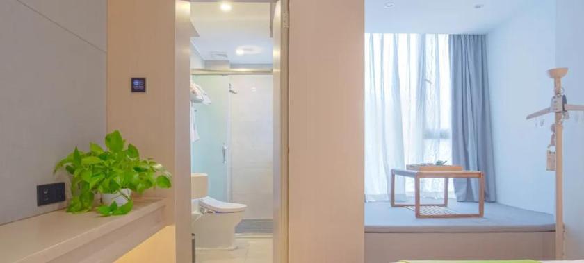 Imagen de la habitación del Hotel ANXIN APARTMENT. Foto 11