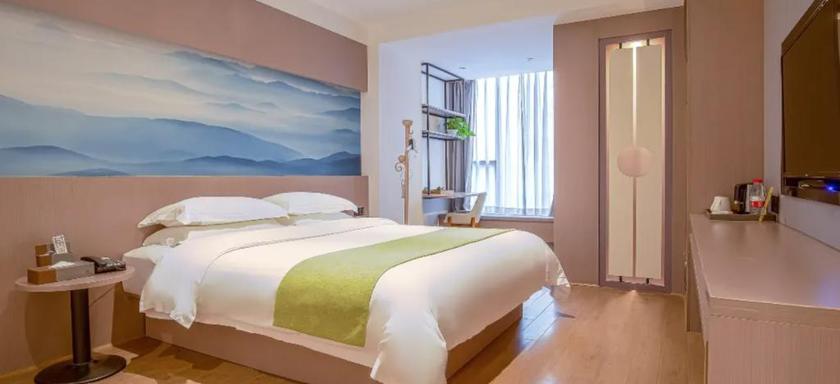 Imagen de la habitación del Hotel ANXIN APARTMENT. Foto 15