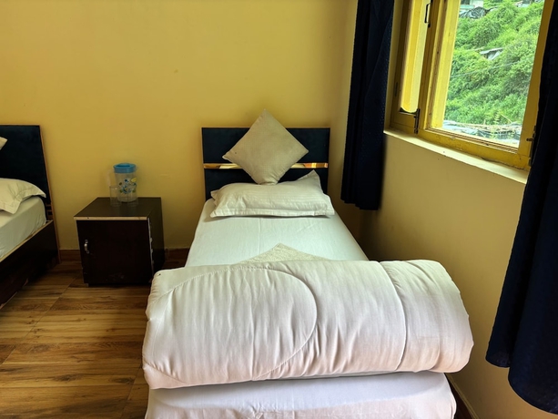 Imagen de la habitación del Hotel AP Residency Yamunotri. Foto 12