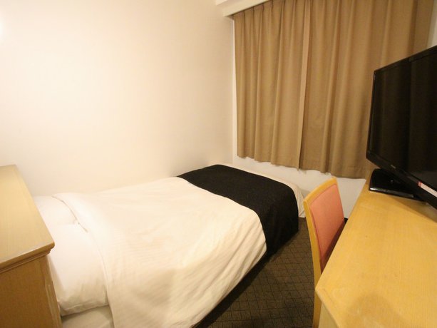 Imagen de la habitación del Hotel APA Hotel Komatsu. Foto 12
