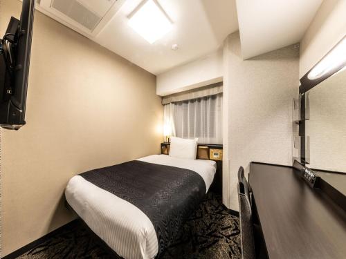 Imagen de la habitación del Hotel APA Hotel and Resort Osaka Namba Ekimae Tower. Foto 2