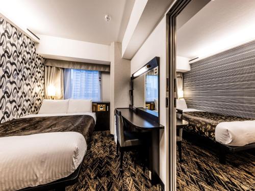 Imagen de la habitación del Hotel APA Hotel and Resort Osaka Namba Ekimae Tower. Foto 5