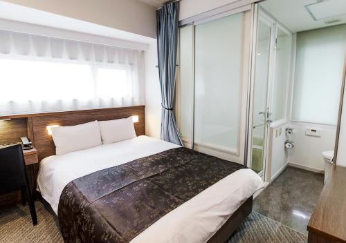 Imagen de la habitación del Hotel APA Kamata Ekimae. Foto 13