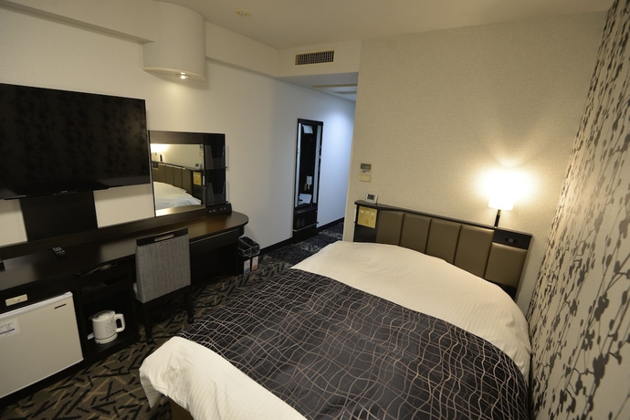 Imagen de la habitación del Hotel APAHOTEL. Foto 7