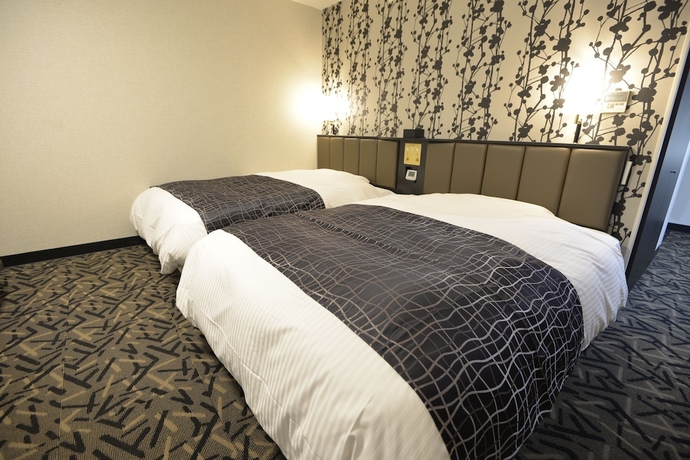 Imagen de la habitación del Hotel APAHOTEL. Foto 9