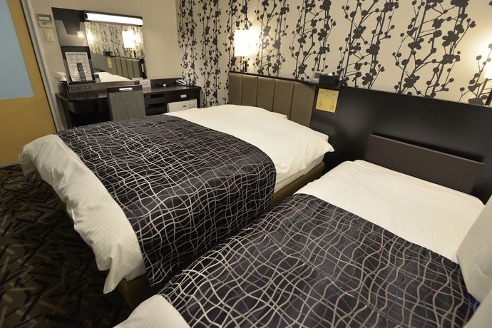 Imagen de la habitación del Hotel APAHOTEL. Foto 11