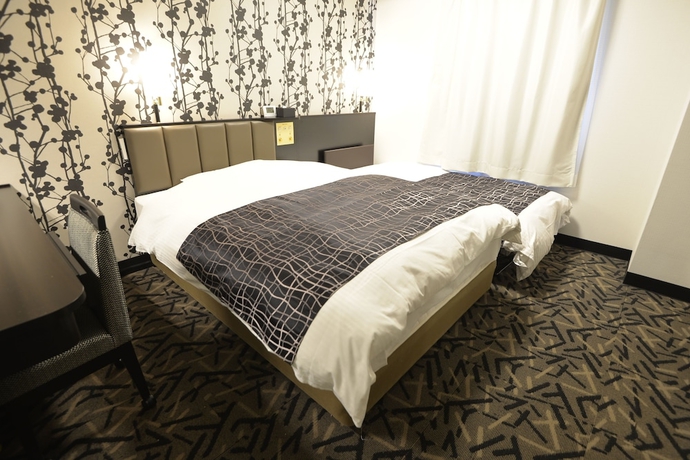 Imagen de la habitación del Hotel APAHOTEL. Foto 12