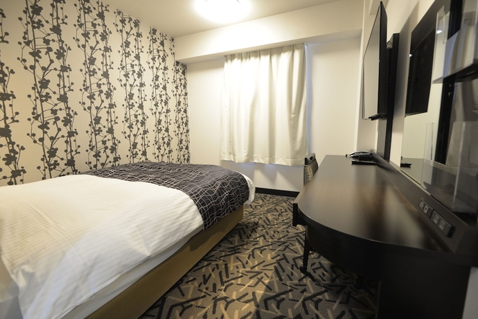 Imagen de la habitación del Hotel APAHOTEL. Foto 15