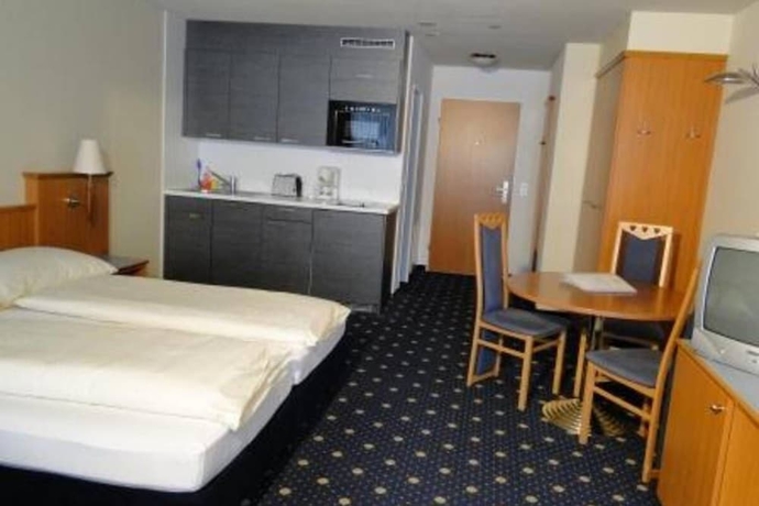 Imagen de la habitación del Hotel APART HOLIDAYS Morschach. Foto 12