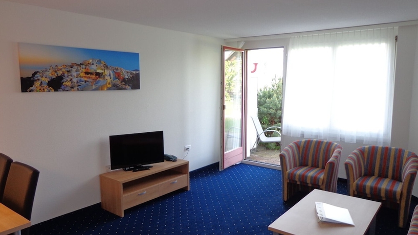 Imagen de la habitación del Hotel APART HOLIDAYS Morschach. Foto 14