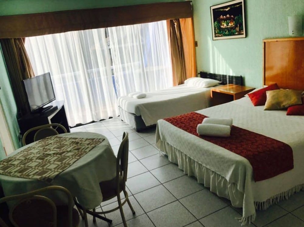 Imagen de la habitación del Hotel APART HOTEL COSTA RE&Ntilde;ACA. Foto 7