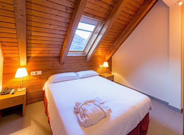 Imagen de la habitación del Hotel APARTAMENTOS TRAINERA. Foto 7