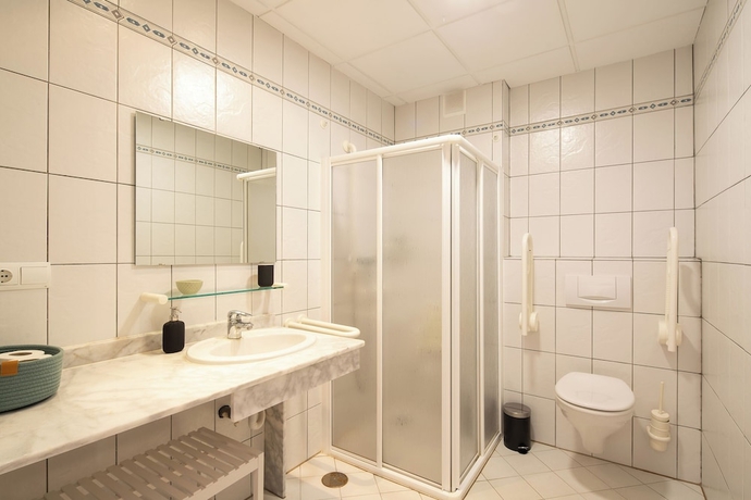 Imagen de la habitación del Hotel APARTAMENTOS TROPICALIA ALMU&Ntilde;ECAR. Foto 5