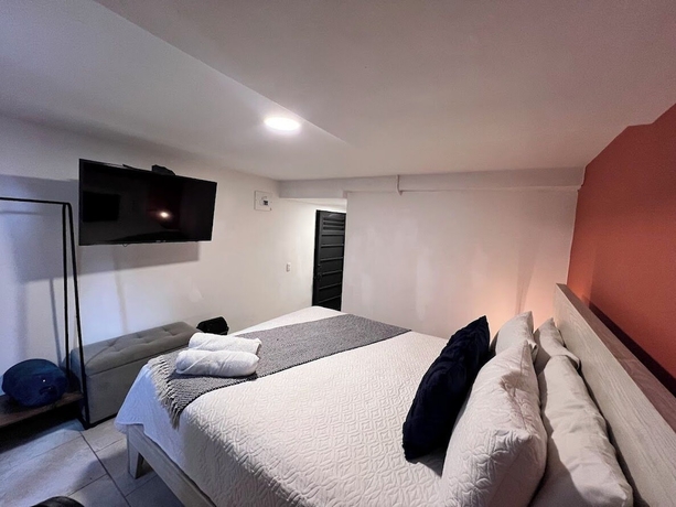 Imagen de la habitación del Hotel APARTAMENTOS VIRGINIA 34. Foto 7