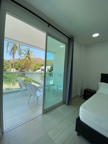 Imagen de la habitación del Hotel APARTASUITES RAMASA. Foto 10