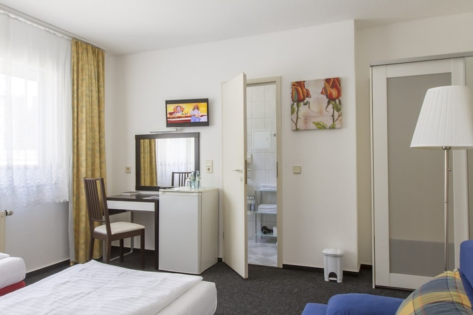 Imagen de la habitación del Hotel APARTHOTEL VEGA. Foto 11