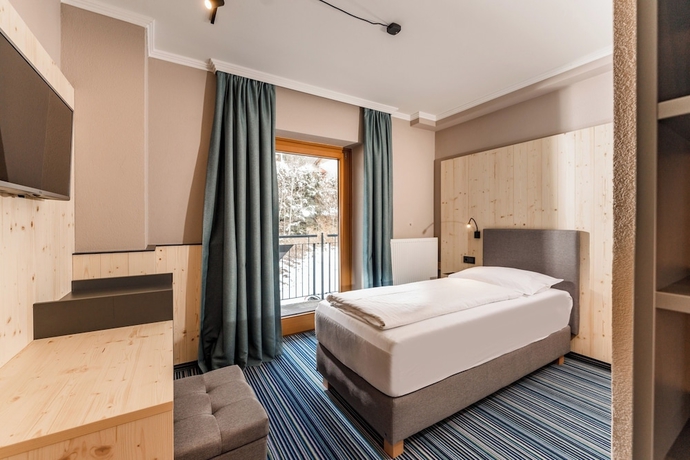 Imagen de la habitación del Hotel APPARTHOTEL FERIENALM. Foto 10