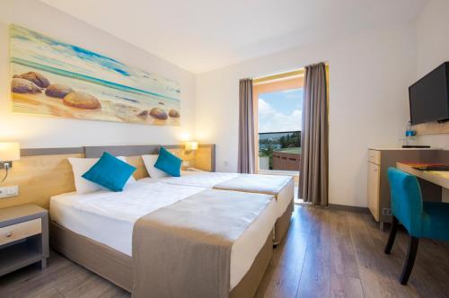 Imagen de la habitación del Hotel AQI Pegasos Club, İncekum. Foto 18