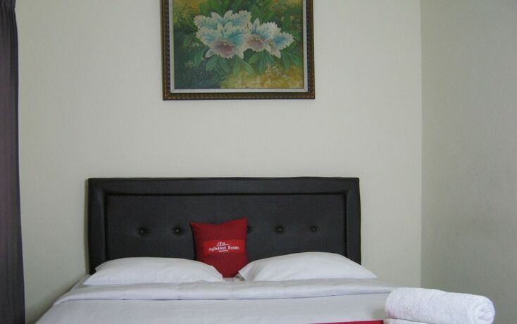 Imagen de la habitación del Hotel AQILAKOST n CAFE Gadog Puncak. Foto 17
