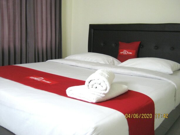 Imagen de la habitación del Hotel AQILAKOST n CAFE Gadog Puncak. Foto 20