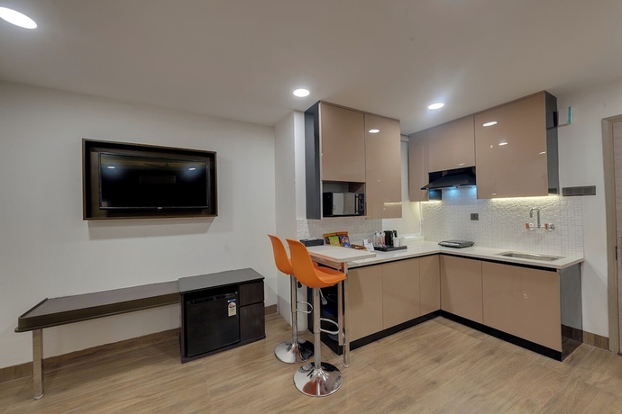 Imagen de la habitación del Hotel AR Suites Sohna Road. Foto 9