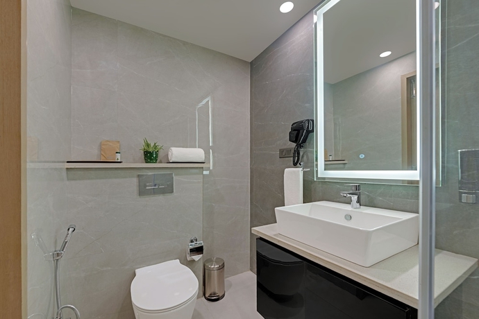 Imagen de la habitación del Hotel AR Suites Sohna Road. Foto 14