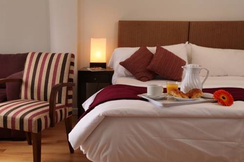 Imagen de la habitación del Hotel ARC Callao Studios and Suite. Foto 8