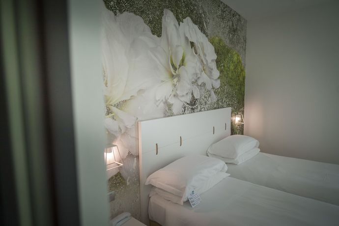 Imagen de la habitación del Hotel ARLI Hideaway Punta Ala. Foto 2