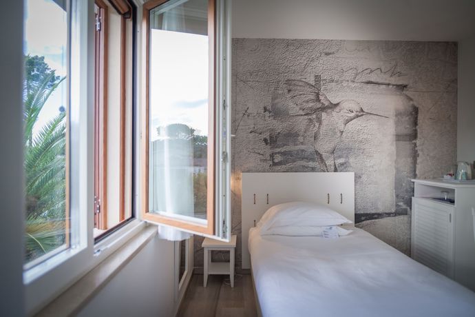 Imagen de la habitación del Hotel ARLI Hideaway Punta Ala. Foto 4