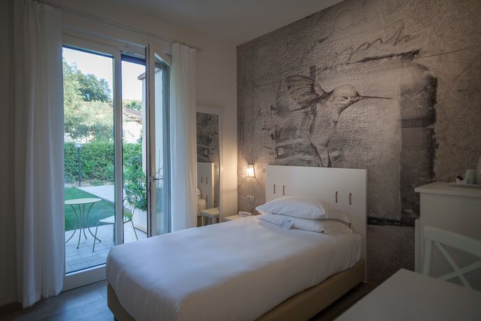 Imagen de la habitación del Hotel ARLI Hideaway Punta Ala. Foto 6