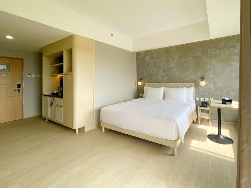 Imagen de la habitación del Hotel ARTOTEL Casa Cikarang, Sukamahi. Foto 9