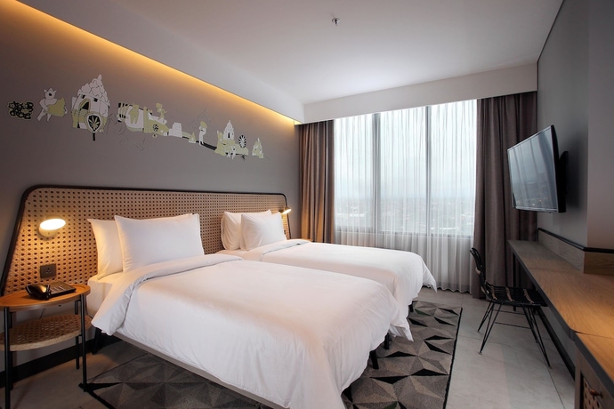 Imagen de la habitación del Hotel ARTOTEL Yogyakarta. Foto 8