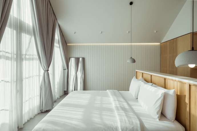 Imagen de la habitación del Hotel ASAI Village. Foto 15