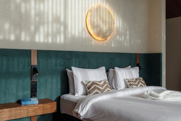 Imagen de la habitación del Hotel ASAI Village. Foto 18