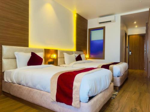 Imagen de la habitación del Hotel ASIAN BUDDHA HOTEL. Foto 19