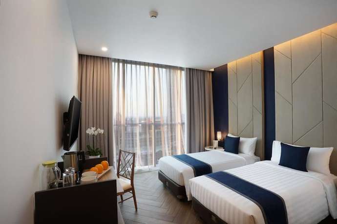 Imagen de la habitación del Hotel ASTON Kemayoran City. Foto 2
