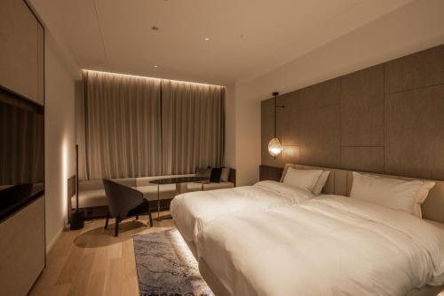 Imagen de la habitación del Hotel ATAGO HOTEL. Foto 17