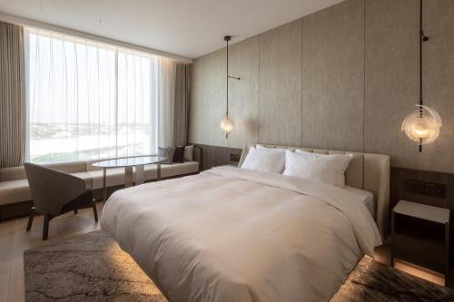 Imagen de la habitación del Hotel ATAGO HOTEL. Foto 18