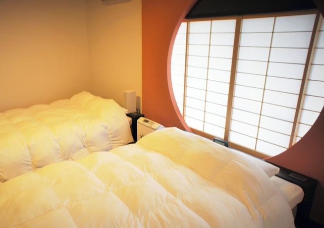 Imagen de la habitación del Hotel ATAMI SPRING TERRACE HOTEL. Foto 3